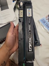 black toner cartridge, labeled as model CF510A/204A, used in laser printers.