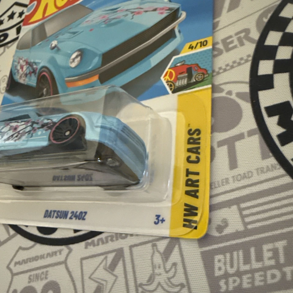 Nuevos autos artísticos Hot Wheels G Case Datsun 240Z Blue Sakura HW 2025 #62 Foto 2 de 4