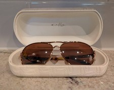 OAKLEY FEEDBACK ROSE GOLD FRAME WITH POLARIZED BROWN LENSES 4079-12