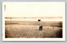 RPPC Two Boys in Hay Field Stacks Suspenders Hats Unused Photo Postcard