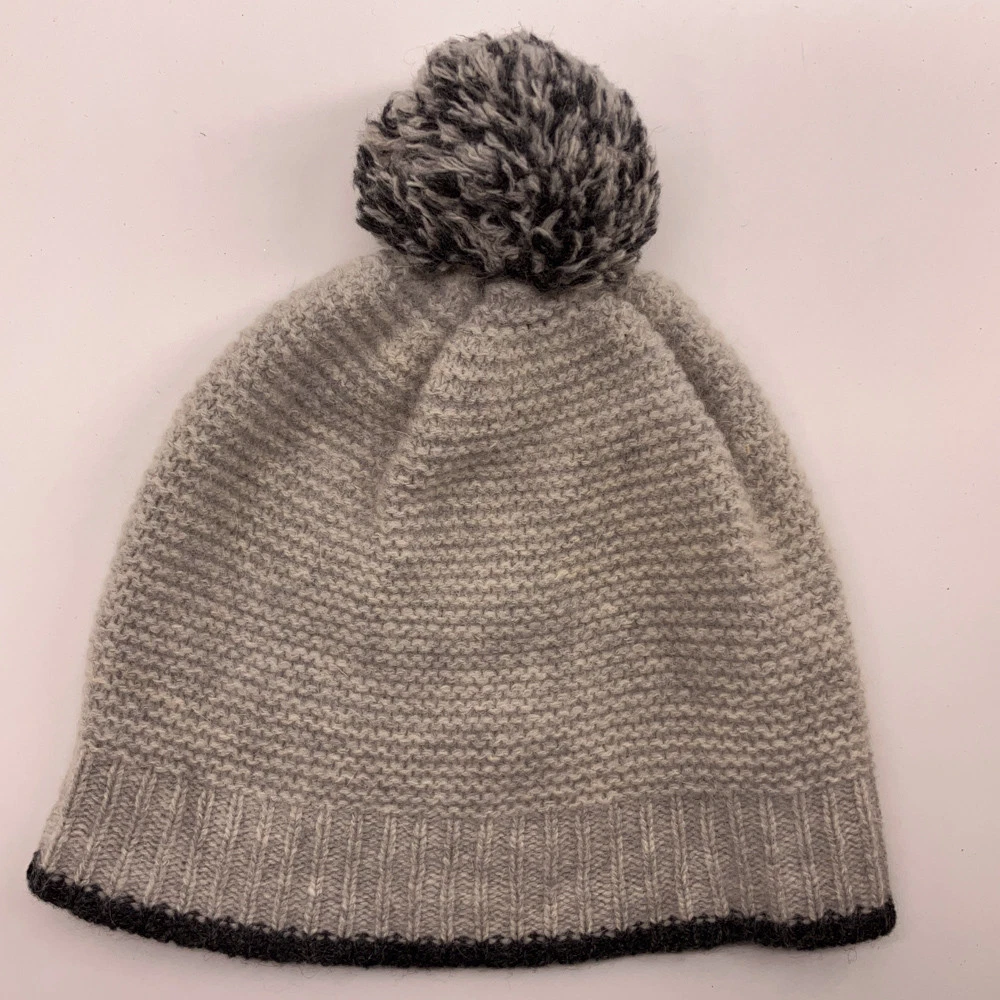 Thin horizontal knit gray winter pom-pom hat