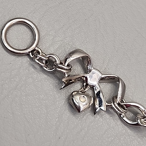 Pulsera de cadena Juicy Couture arco corazón cinta colgante tono plata bordillo 7" - Imagen 7 de 11