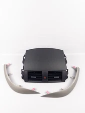 09-11 TOYOTA COROLLA UPPER CENTER DASH HEAT A/C AIR VENTS VENT BEZEL TRIM OEM