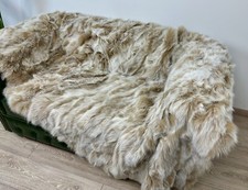 Luxury snow top fox fur blanket throw. Real fur blanket