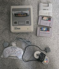 Nintendo SNES Console tested working  with all games cartridge power supply 