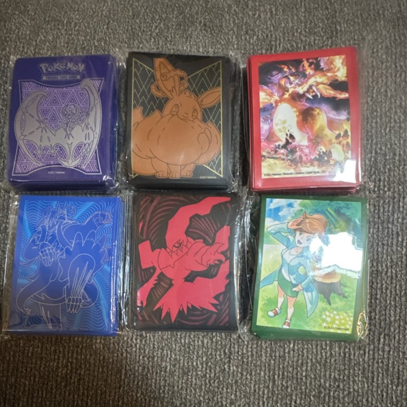 Pokémon Card Sleeves Lot of 6 (Opened containing various amounts) 