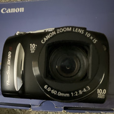 Canon PowerShot SX120 IS 10MP Black Compact 10x IS it turns on powers up try to