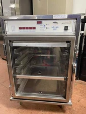 Used Henny Penny HC-903 CDT Heated Holding Pass Thru Cabinet with Flip Doors and