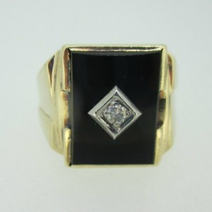 black onyx ring with diamond in center