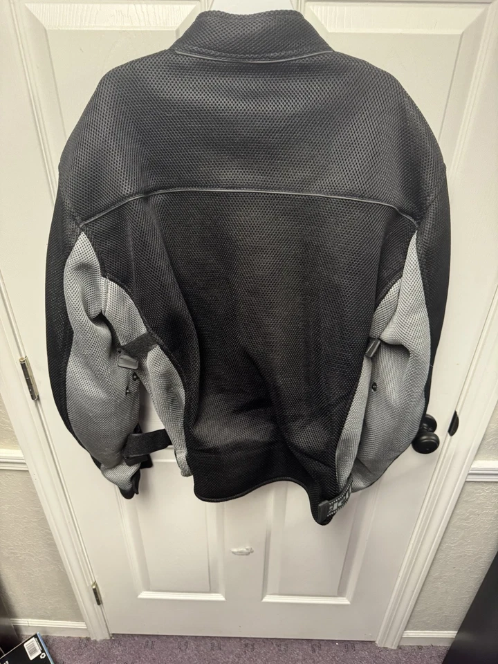 Chaqueta de motociclista Xelement unisex negra blindada forrada acolchada textil talla XL Foto 3 de 4