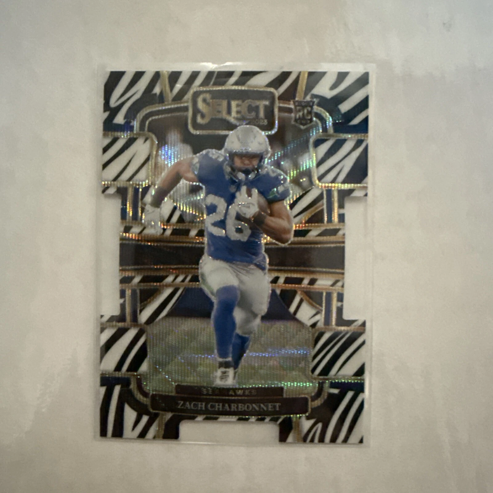 2023 Panini Select - Concourse #86 Zach Charbonnet (RC) ZEBRA CASE HIT