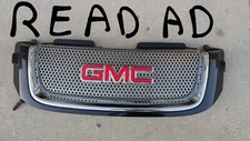 ✅OEM 2005-2009 GMC ENVOY DENALI FRONT GRILLE EMBLEM CARBON BLACK METALLIC NICE!