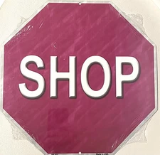 Stop signal with the label: shop - tin sign