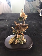 The Leonardo Collection, Wren Perched On Branch With Leaves and Flowers
