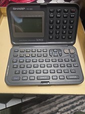 Vintage - Sharp YO-300 Gray Electronic Organizer with 32kb