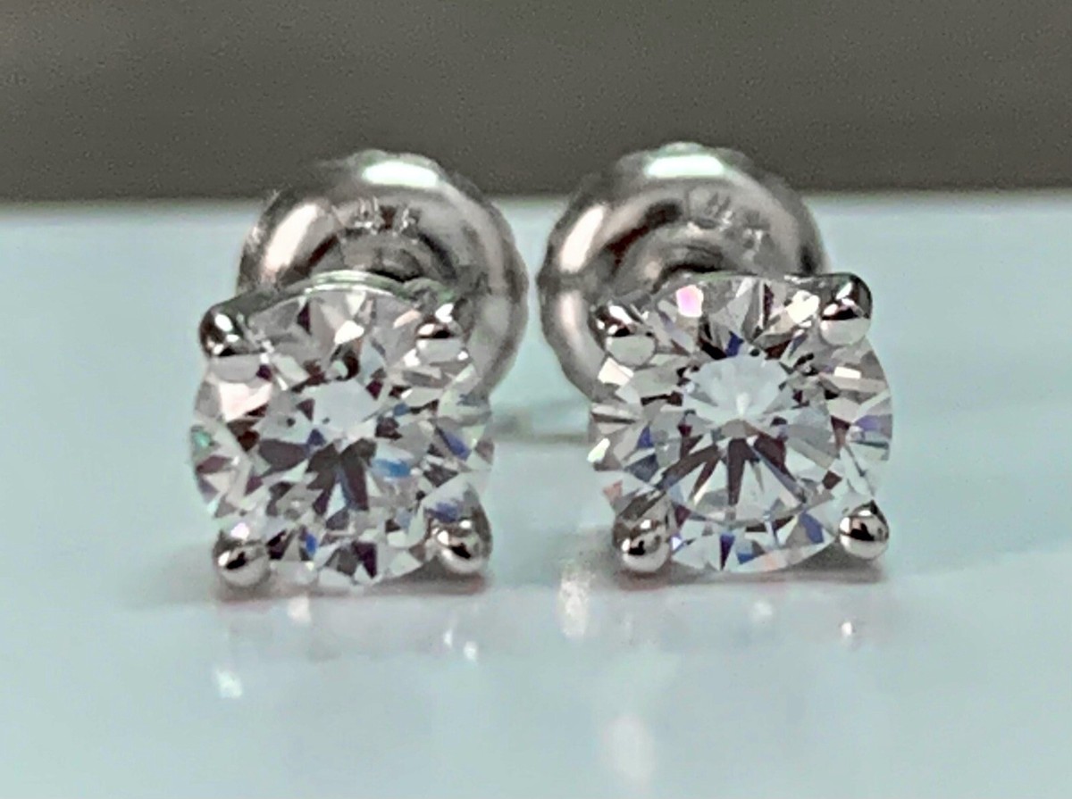 定価3.8万 enasoluna Solid diamond earrings Diamond Asymmetrical Star Stud Earrings - Nuha Jewelers