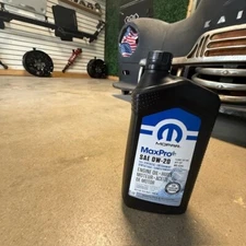 (1) GENUINE Engine Oil  Mopar  68523994AA