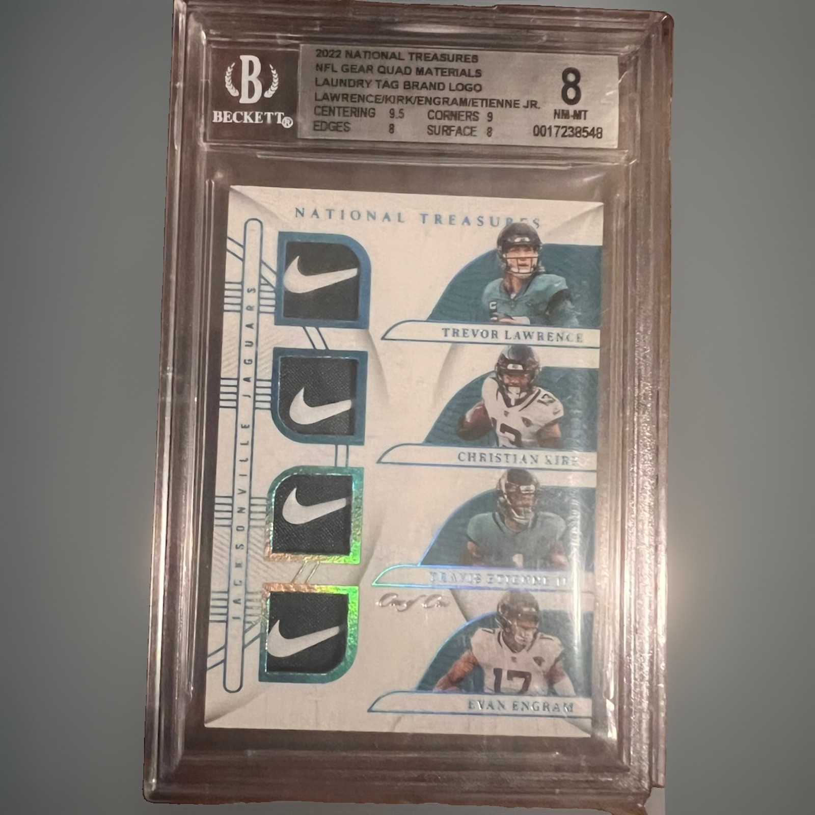 2022 National Treasures NFL Quad Nike Swoosh 1/1 ONE OF ONE Jaguars(game worn) view 1