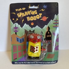 VINTAGE WIND UP SPARKING ROBOT NEW 1994