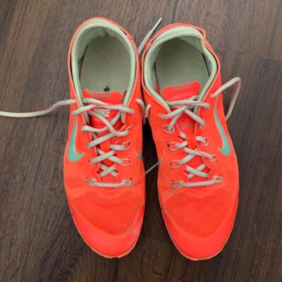 neon orange nike tennis shoes