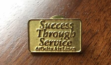 Vintage Delta Air Lines “Success Through Service” Metal Gold Tone Lapel Pin