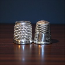 Two antique honeycomb sterling silver sowing thimbles sizes 8 & 11 Two antique honeycomb sterling silver sowing thimbles sizes 8 & 11 - Image 1