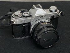 PRISTINE VINTAGE CANON AE-1 WITH FD 50MM F/1.8 S.C. LENS - SILVER BODY