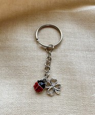 Portachiavi portafortuna quadrifoglio coccinella artigianale acciaio