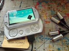 PSP Go White - tested working with charger, AV cables, and 2gb card