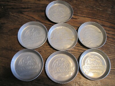 VTG STANHOME PRODUCT EMBOSSED ALUMINUM METAL COASTER LOT OF 7 PCS