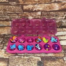 Hatchimals Colleggtibles Shimmer Babies 12-pack Pink egg carton