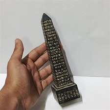 Handmade Egyptian obelisk with hieroglyphs, elegant ancient decor piece