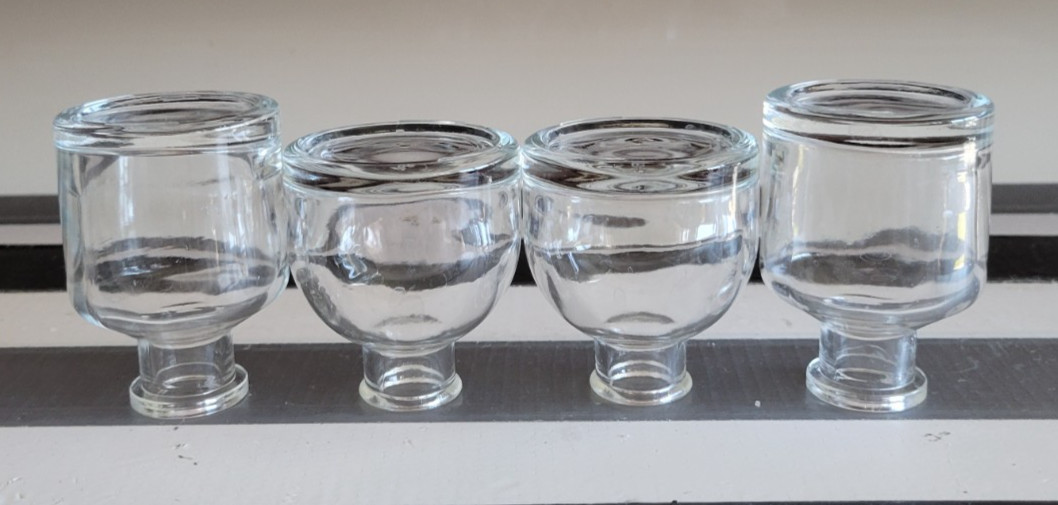 4 CLEAR GLASS MINI DECORATIVE BOTTLES SHORT AND TALL 2.75 AND 3 INCHES
