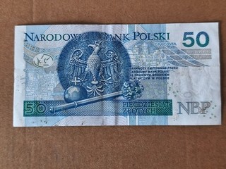 Pologne 50 zlotych risque déchirure pliure etc..