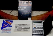 WORKING Casio MG-880 Game Calculator with box, Instructions  Promo Card.