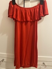 red sleeveless plt bodycon dress