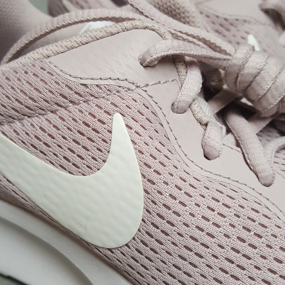 pink nike tanjun shoes