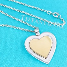 Ciondolo cuore Tiffany & Co. in oro giallo 18 carati 750 e argento sterling 925