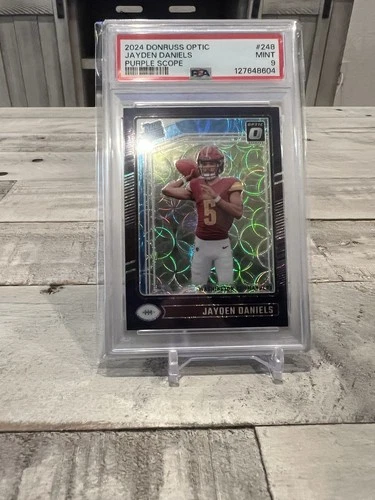 5282 Jayden Daniels 2024 Donruss Optic #248 Purple Scope Rated Rookie PSA 9