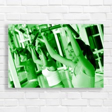 Fit Women Working Out at Gym Green Canvas Print Large Picture Wall Art