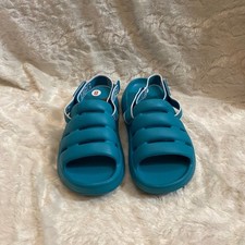 UGG slippers. NWOT. Size 8. Color Blue