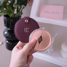 [PRE-ORDER] CHARLOTTE TILBURY CT POCKET ROUND MIRROR TRAVEL + POUCH - GOLD