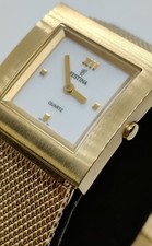 Montre Festina plaquée Or comme neuve
