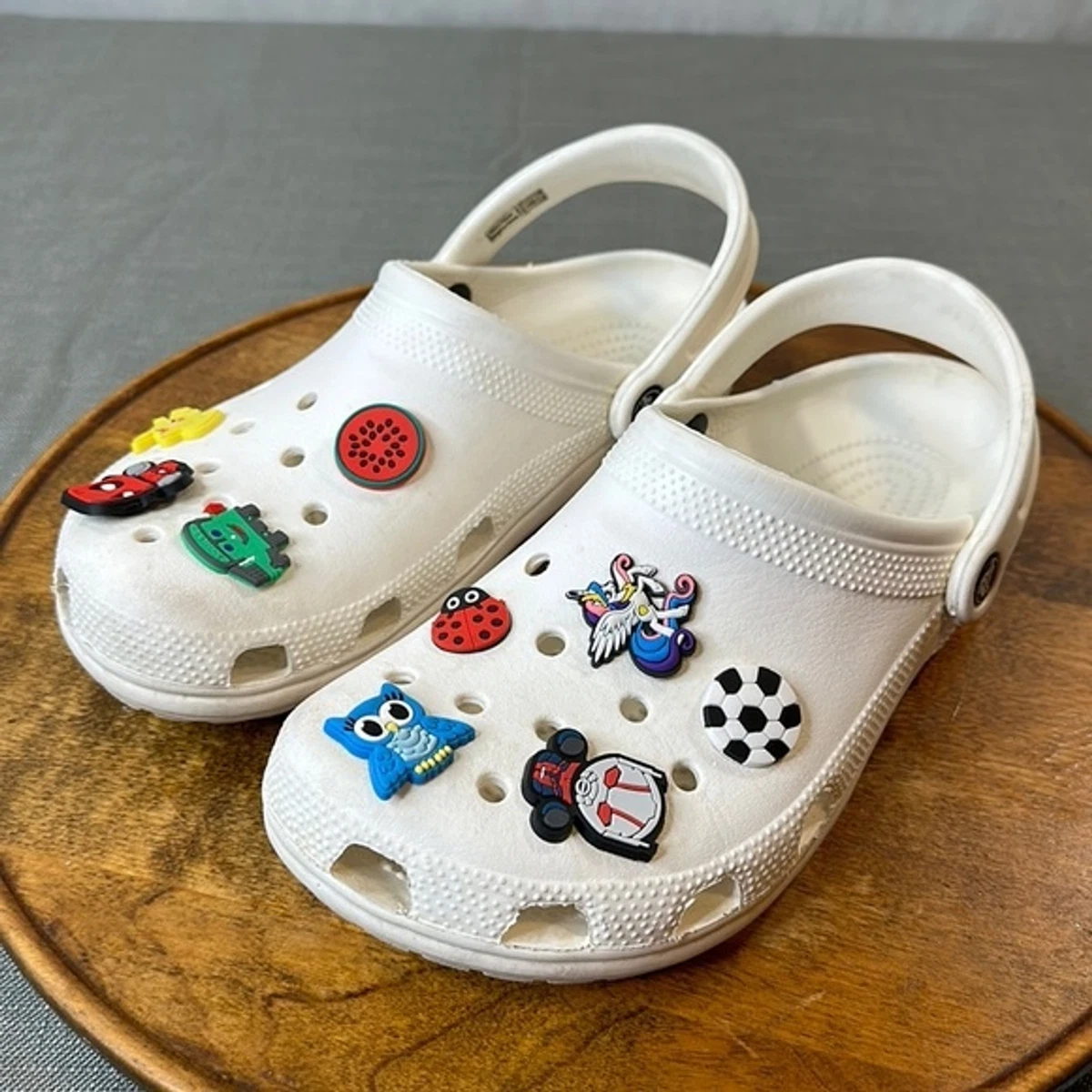 White crocs with sale pins