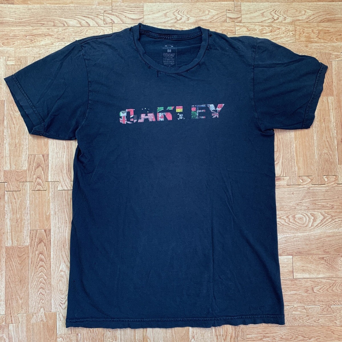 Vintage Oakley International Skull T-shirt Navy Blue Faded