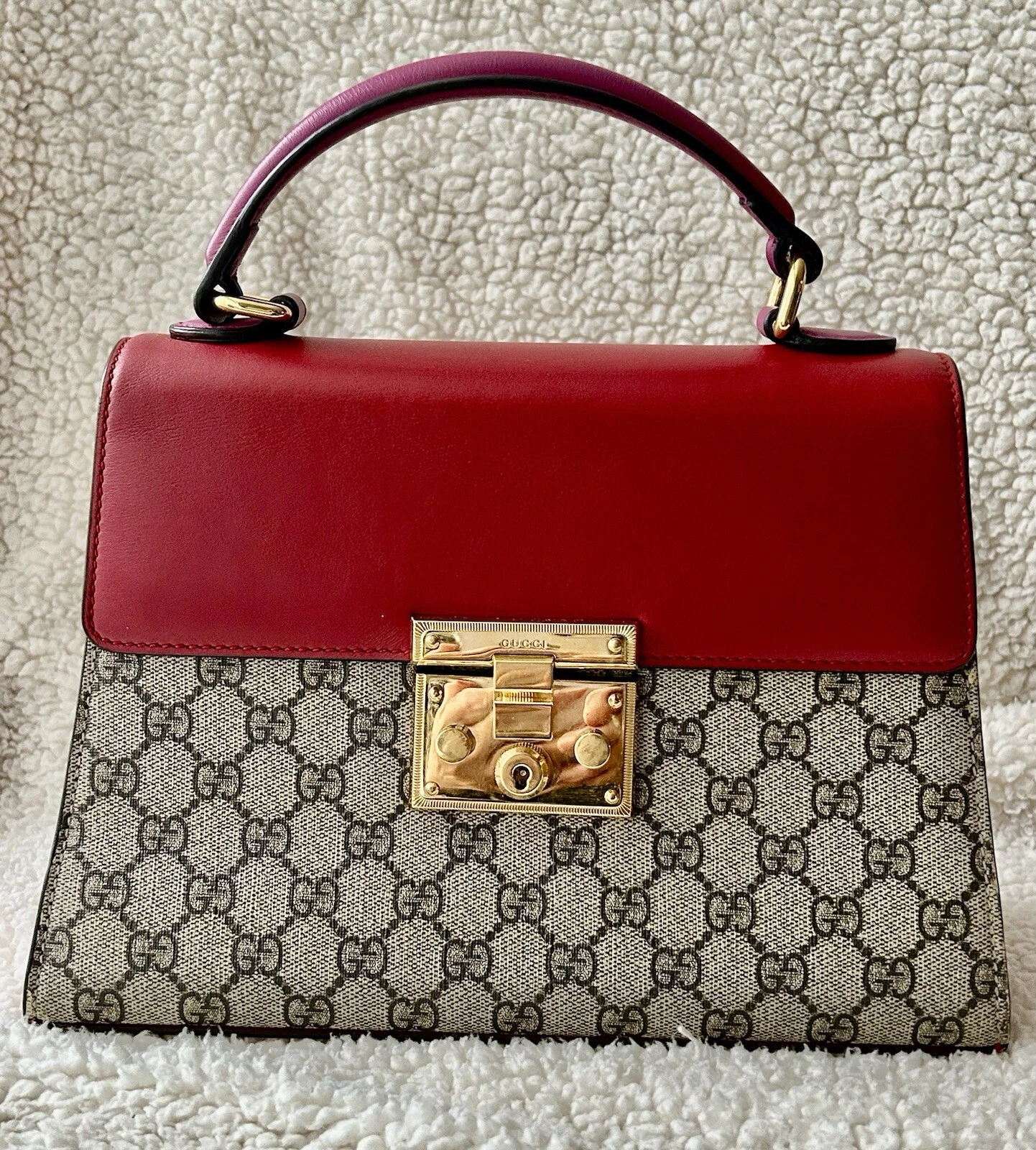 Borsa Gucci con lucchetto manico superiore GG rivestita in tela e pelle piccola