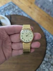 Vintage Timex M Cell Quartz Watch: Model T22, Gold Tone, Analog - Circa 1970's