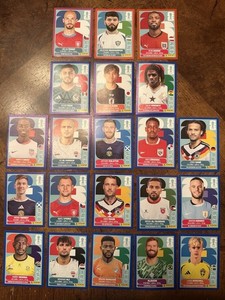 2026 Panini World Cup Sticker Parallel Lot- 1 Purple, 1 Red, 1 Orange, & 18 Blue