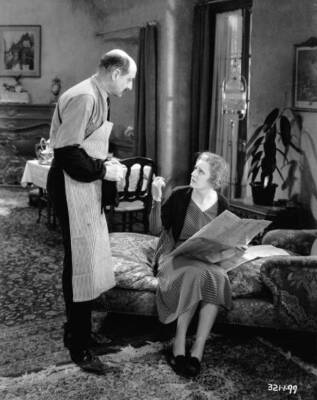 Irene Dunne gives instructions to Paul Weigel in a scene from 'Bac- Old Photo
