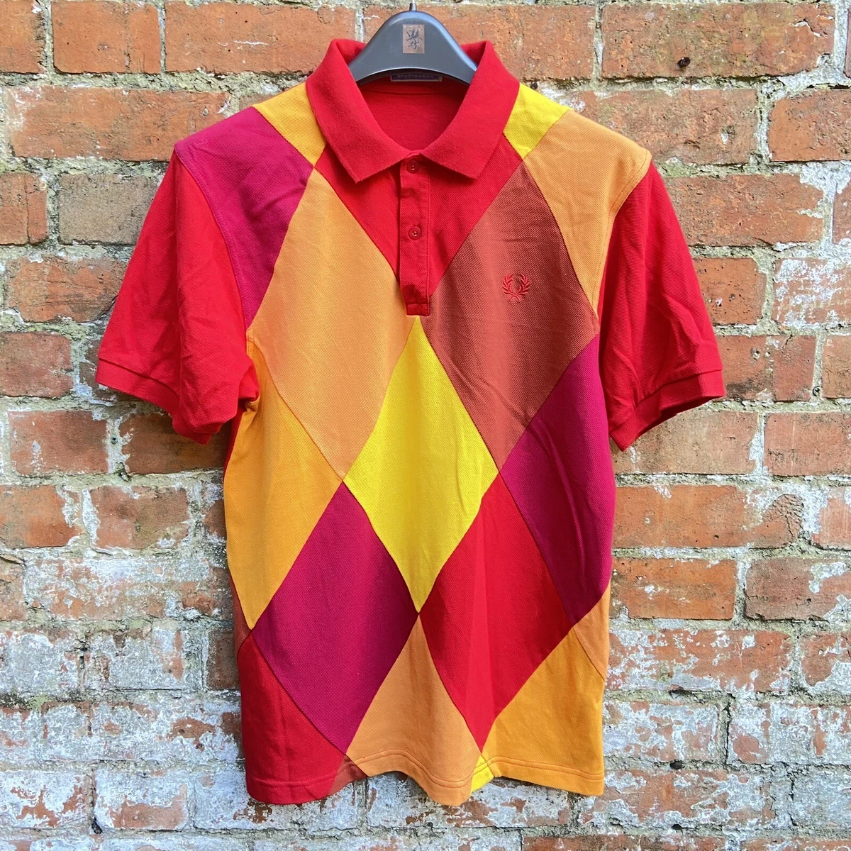 Fred perry clearance orange polo shirt